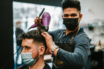 barber drying hair