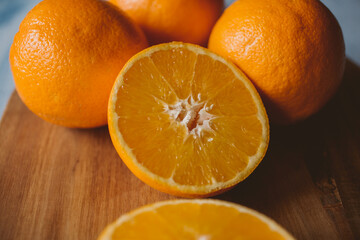 Ripe oranges on wooden background. organic orange fruit.	