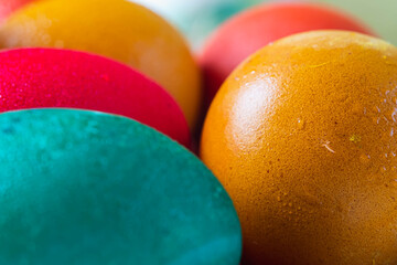 still life colored easter eggs in rustic style blur background