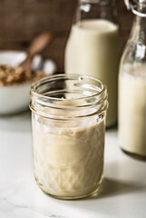 Homemade Soy milk in mason jar and bottles
