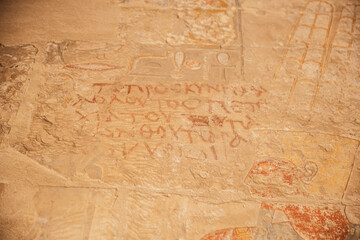 Fototapeta na wymiar Greek graffiti in Ancient Egyptian Hatshepsut Temple 