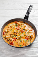 seafood saute in a pan, top view