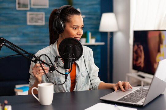 Social Media Vlogger Speaking With Followers On Online Podcast Using Professional Microphone. New Media Star Influencer Recording Podcast Series For Audience