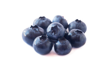 Blueberries isolation. Ripe blueberries with copy space for text. Heap of blueberry isolated on white. Bilberries on a white background. Blueberries on a white background.