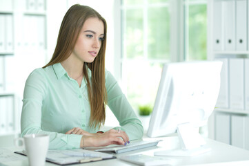 Portrait of  businesswoman working in office