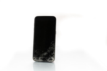 Broken glass screen on a smartphone, isolated against a white background