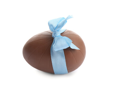 Chocolate Egg With Light Blue Bow Isolated On White