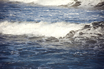Sea waves and foam of Mediterranean sea with strong wind, Spain,