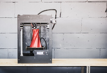 3D printer working close up. Automatic three dimensional 3d printer