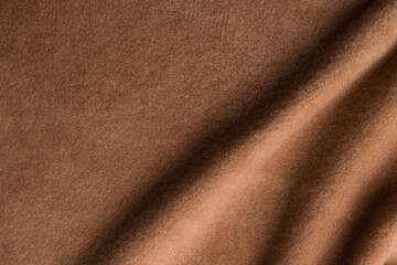 Background texture. Brown alpaca wool fabric