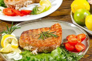 Tuna steak cooked on the electric grill. tunafish served on a plate with fresh herbs and vegetables. healthy nutritious, Healthy Eating for a Healthy Weight