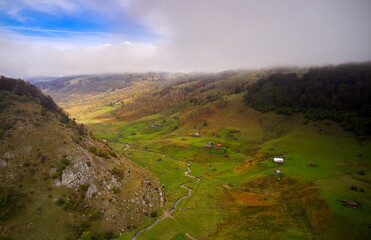 mountain landscape in summer morning - Fundatura Ponorului, Romania - aerial view