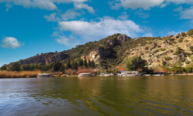 (Dalyan - Mugla - Turkey 05 February .2021) Cruise boats on the river between Köycagiz Lake and Iztuzu beach in Dalyan.