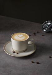 Morning aromatic invigorating coffee on a dark background