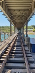 Fototapeta na wymiar Railway bridge over the sea