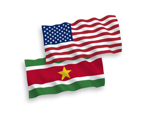 Fototapeta premium Flags of Republic of Suriname and America on a white background