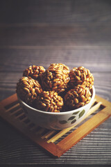 Indian homemade sweet Puffed wheat candy balls	
