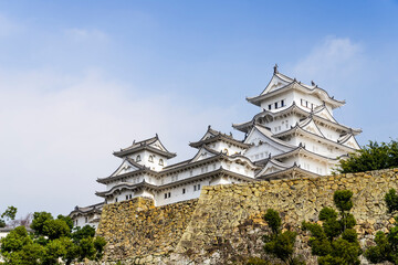 Fototapeta premium View of Himeji Castle in Kansai, Japan, considered as Japan's most spectacular castle and popular tourist destination. The place is one of the UNESCO World Heritage Site.