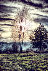 Visionary sunset over small village to the south of Poland