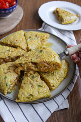 Potato omelette Spanish tortilla in a plate. 