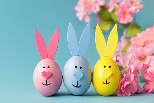 Easter egg Bunny on blue background. DIY decoration Easter. Craft concept
