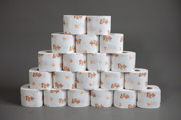 toilet paper and easter rabbit on a grey background
