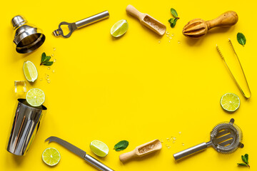 Flat lay frame of bar accessories and ingredients for mojito cocktail