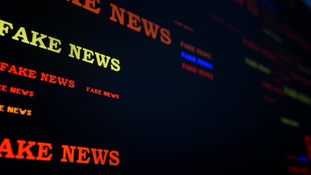 Animation with a multitude of multi colored "fake news" writings appearing on a black screen. Perspective view