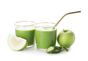 Glasses of healthy green smoothie and ingredients on white background