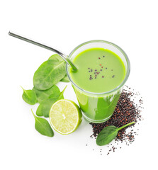 Glass of healthy green smoothie and ingredients on white background