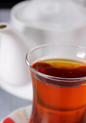 a cup of Turkish tea with teapot