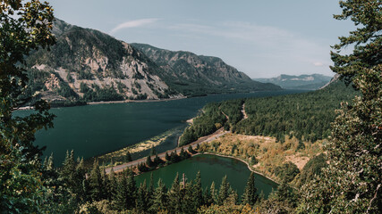 A panoramic view of Grant Lake and the Columbia River from the Dog Mountain Trail along the Columbia River Gorge, Washington, USA on a clear sunny morning. 