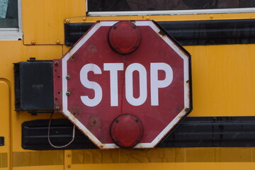 red stop sign in traffic