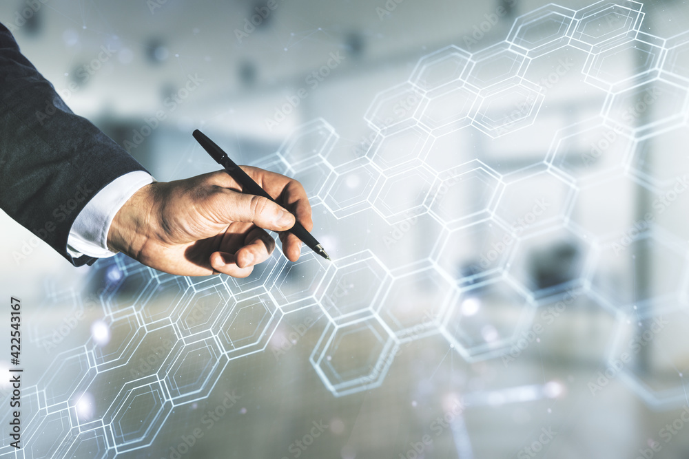 Aufkleber Male hand with pen draws abstract virtual technology sketch with hexagon grid on blurred office background, future technology and AI concept. Double exposure