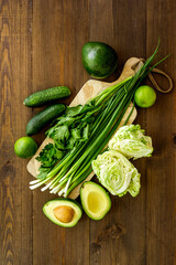 Harvest of green vegetables and fruits. Raw food diet. Top view