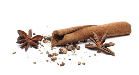 Star anise, aromatic allspice, pimento, cinnamon stick isolated on white background, macro 