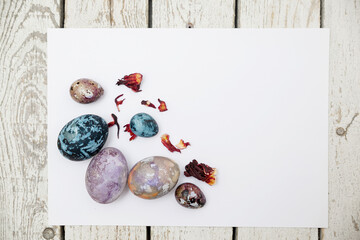 Easter eggs, the concept of natural eco-friendly dyes. Postcard with place for text copy space