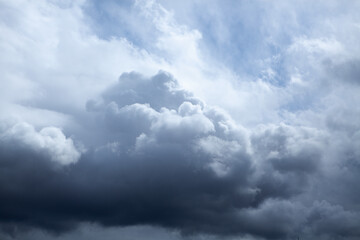 Fototapeta premium Dark sky and a sharp black cloud before the rain.