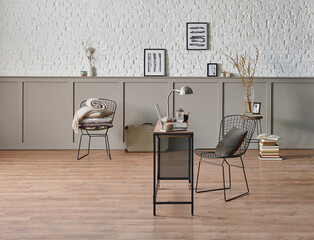 Working room at home style with wooden table laptop and metal black chair, poster brick wall.