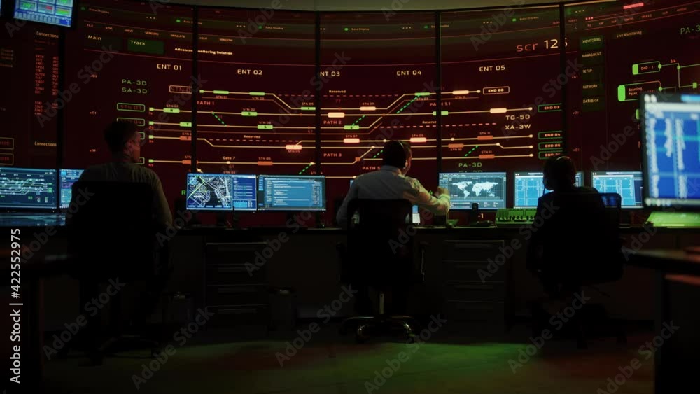 Leinwandbilder Professional IT Technical Support Specialists and Software Programmer Working on Computers in Monitoring Control Room with Digital Screens with Server Data, Blockchain Network and Surveillance Maps. 