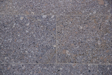 Exterior decoration of the house with stone and tiles.