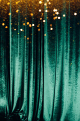 The green curtain made of luxurious velvet on the stage of the theater is fantastically glittering