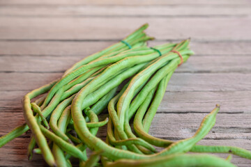 Long beans on the wooden table