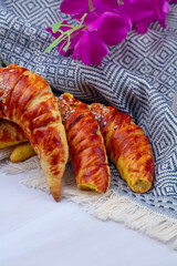 Сroissant on a wooden table