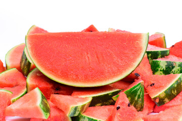Watermelon cut into pieces The red meat has a sweet and juicy taste. Put on a white background