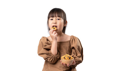 Portrait of happy young Asian girl eating whole grains cookie isolated on white background