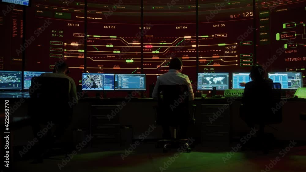 Leinwandbilder Professional IT Technical Support Specialists and Software Programmer Working on Computers in Monitoring Control Room with Digital Screens with Server Data, Blockchain Network and Surveillance Maps. 