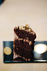 A delicious piece of cake lies on the table