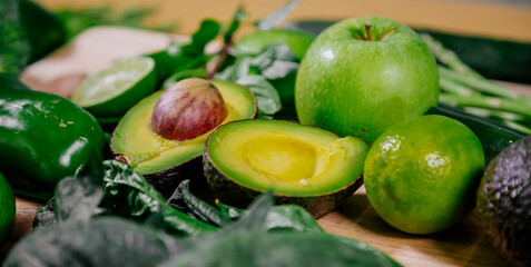 Healthy food clean eating selection: fruit, vegetable, seeds, superfood, leaf vegetable and mediterranean dishes. Detox and clean diet. Foods high in vitamins, minerals and antioxidants.