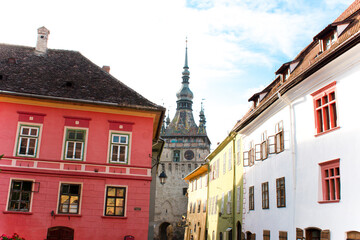 Obraz premium Low angle view of clock medieval tower in Sighisoara, Romania, Transylvania 